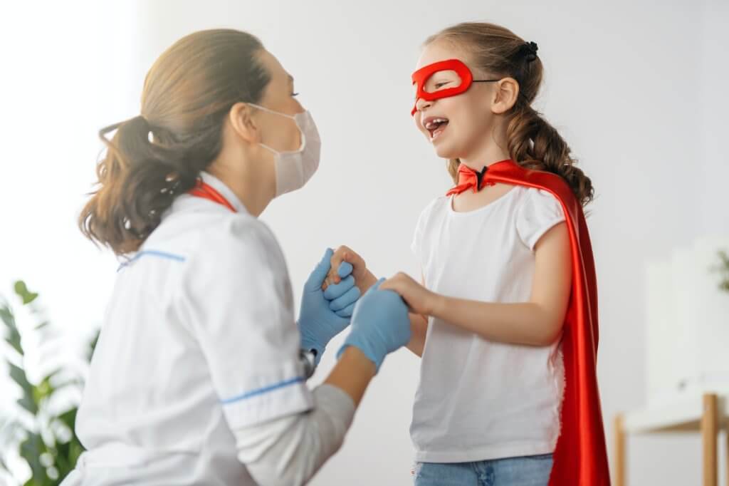 Doctor and child at hospital in Kansas City, Missouri