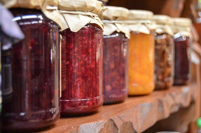 Move Food Items | Gunter Pest & Lawn Move Food Items. Glass Jars in Cabinet.